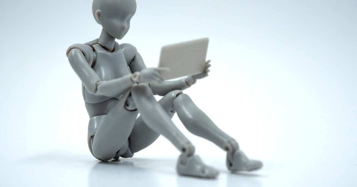 Robot hand clicking representing bot traffic and ad fraud